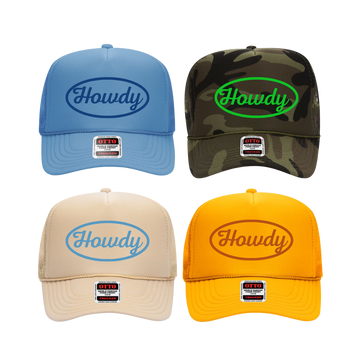 A collection of four custom trucker hats in different colors, each featuring the text 'Howdy' on the front.