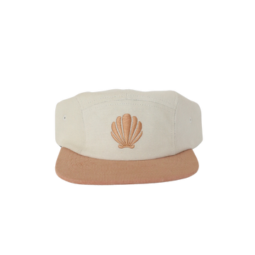 A beige and brown corduroy five-panel hat with an embroidered seashell on the front panel.