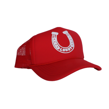 A red trucker hat with a white padded front panel featuring a rope and horseshoe design.