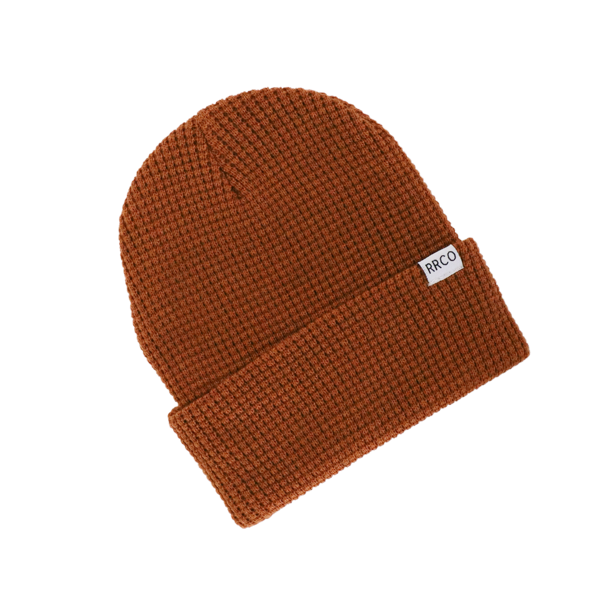 A brown waffle knit beanie with a fold-over cuff, displayed on a neutral background.