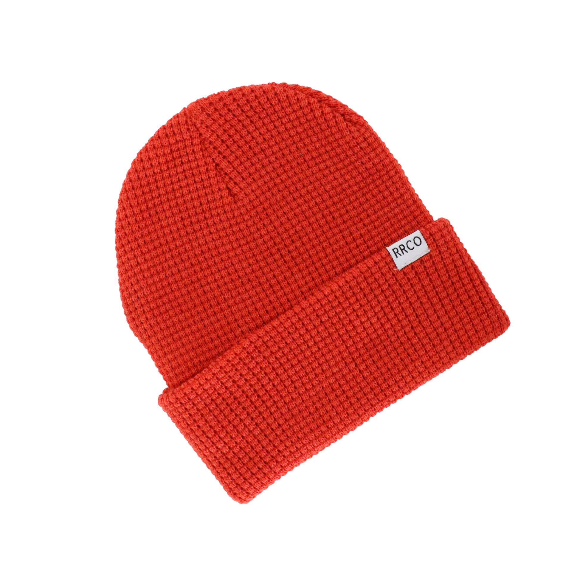 A red waffle knit beanie with a fold-over cuff, displayed on a neutral background.