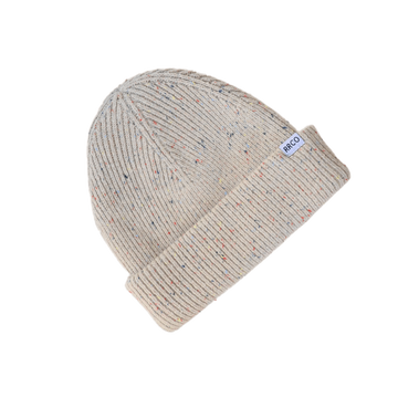 A beige thick knit beanie with a fold-over cuff, speckled with various colors.