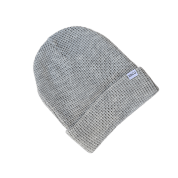 A gray waffle knit beanie with a fold-over cuff, displayed on a neutral background.